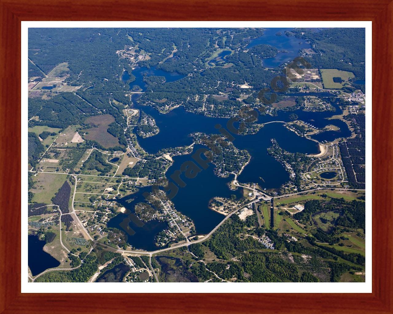 Aerial image of [5505] Canadian Lakes in Mecosta, MI with Cherry Wood frame