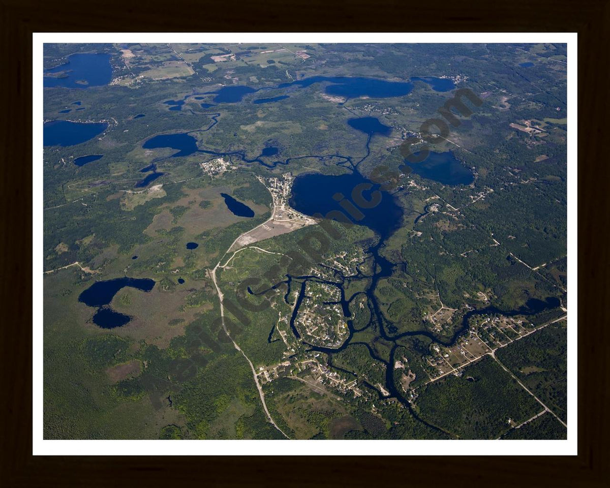 Aerial image of [5511] Tubbs Lake in Mecosta, MI with Black Wood frame