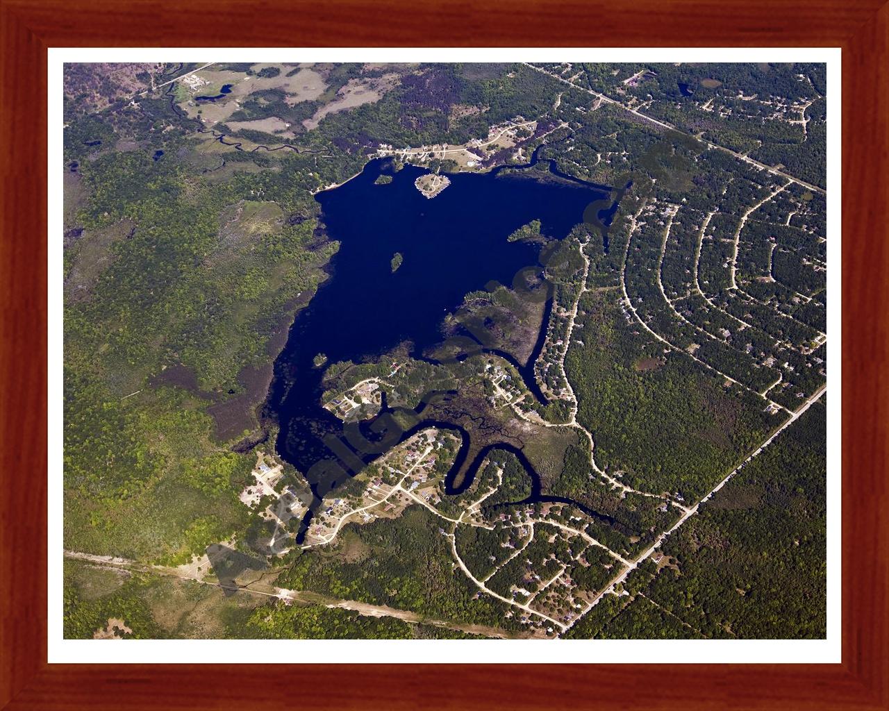 Aerial image of [5514] Hemlock Lake in Clare, MI with Cherry Wood frame