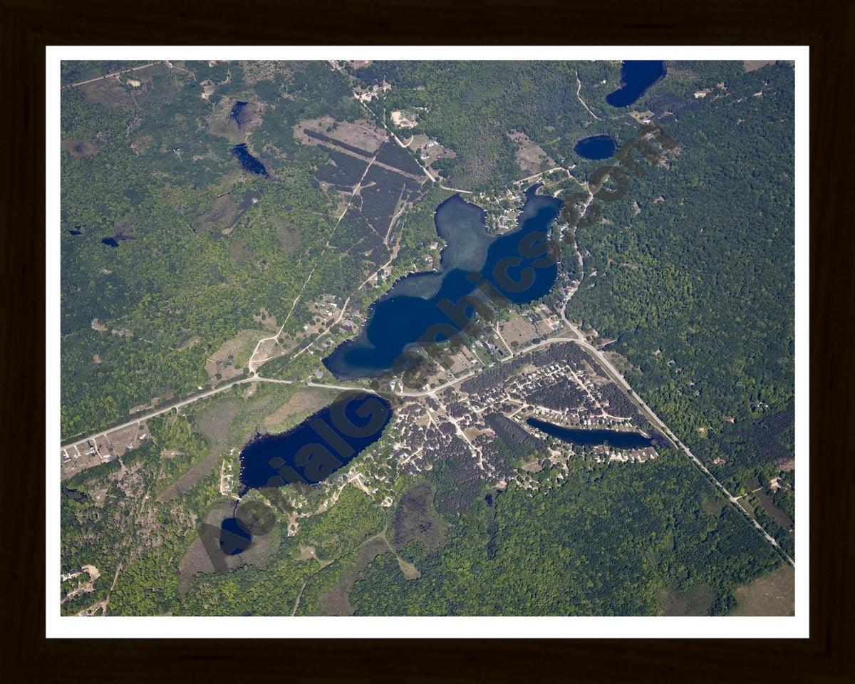 Aerial image of [5515] Grass Lake in Clare, MI with Black Wood frame