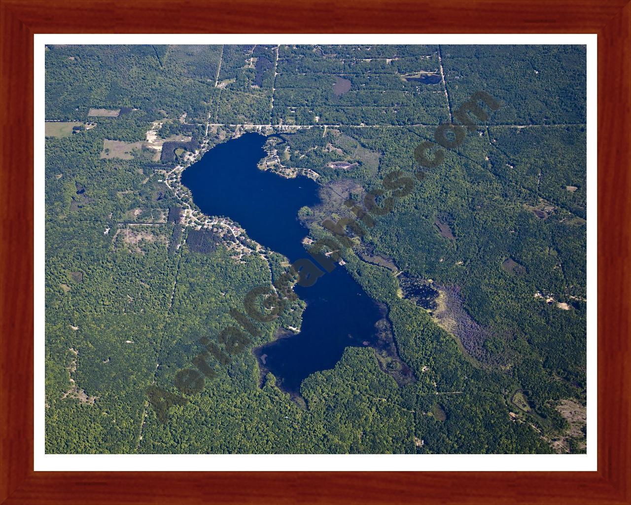 Aerial image of [5516] Lily Lake in Clare, MI with Cherry Wood frame