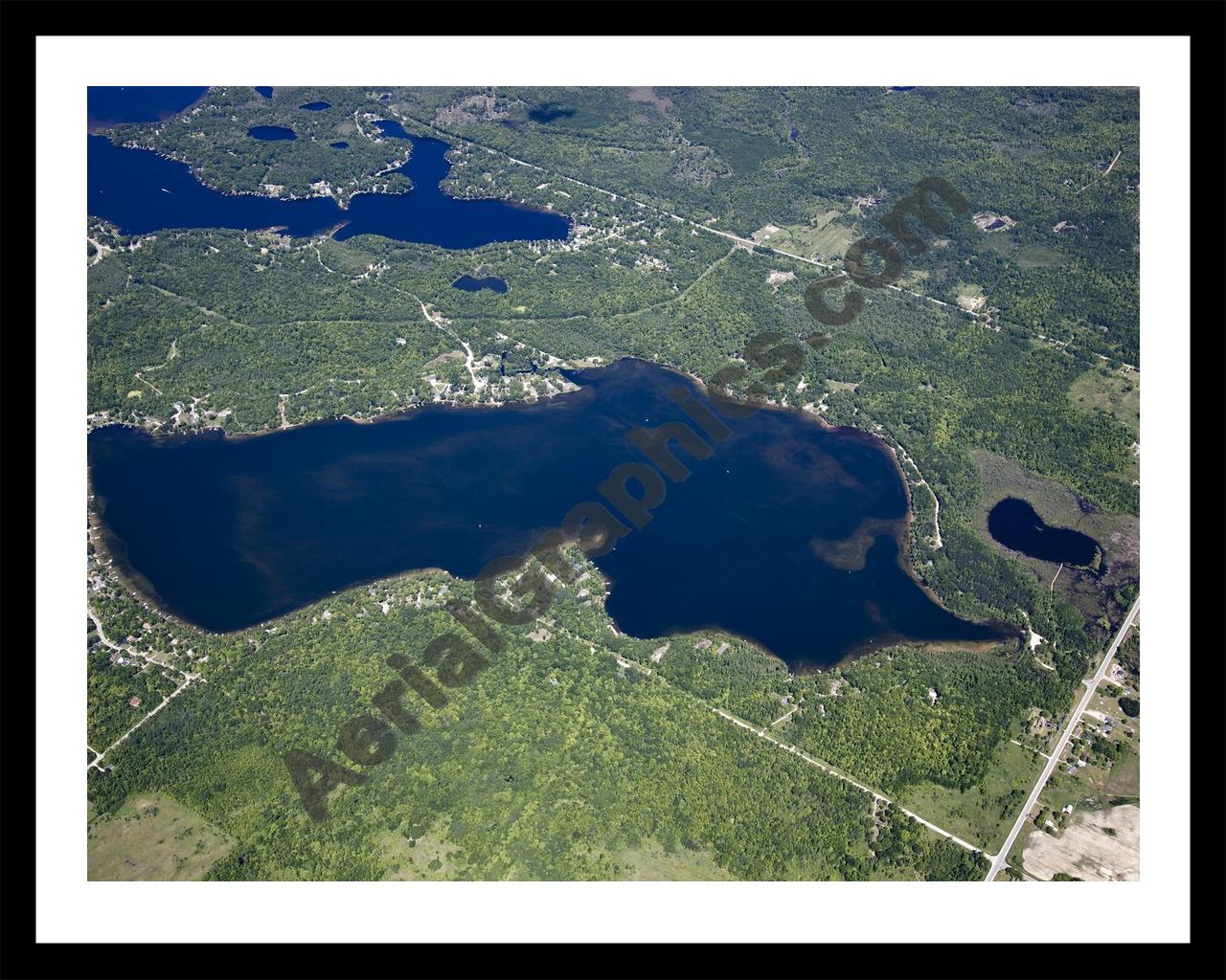 Aerial image of [5533] Loon Lake in Iosco, MI with Black Metal frame