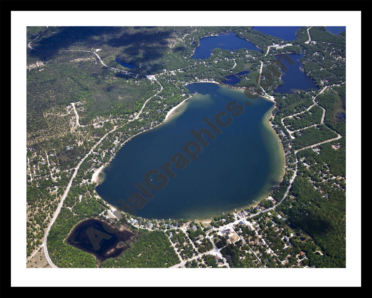 Aerial image of [5537] Sand Lake in Iosco, MI with Black Metal frame