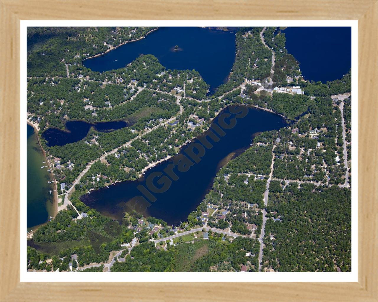 Aerial image of [5538] Floyd Lake in Iosco, MI with Natural Wood frame