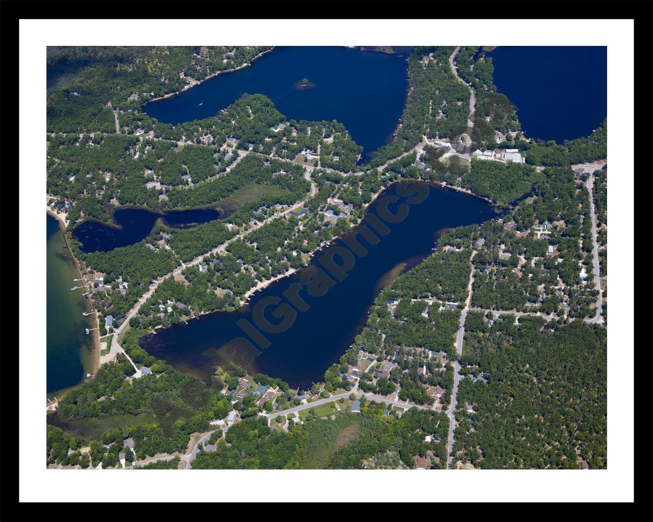 Aerial image of [5538] Floyd Lake in Iosco, MI with Black Metal frame