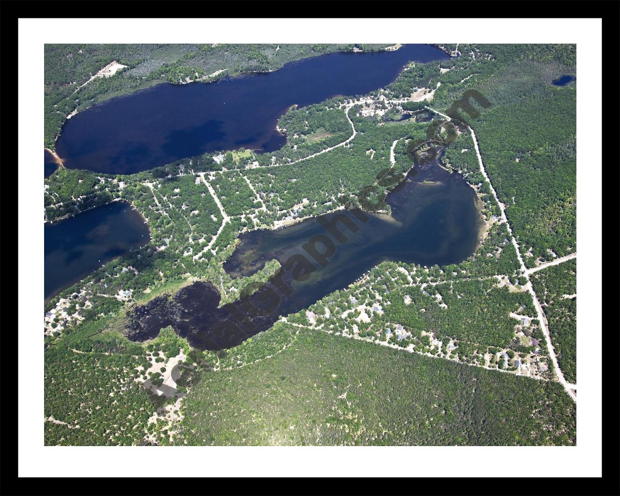 Aerial image of [5541] Indian Lake in Iosco, MI with Black Metal frame