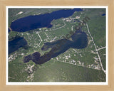 Aerial image of [5542] Island Lake in Iosco, MI with Natural Wood frame