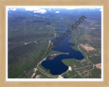 Aerial image of [5544] Foote Dam Pond in Iosco, MI with Natural Wood frame