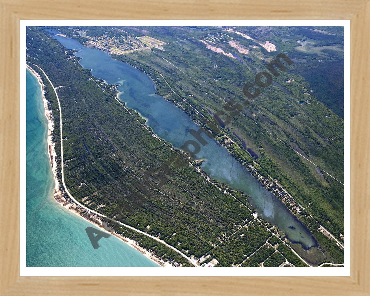 Aerial image of [5547] Cedar Lake (Looking South) in Iosco, MI with Natural Wood frame