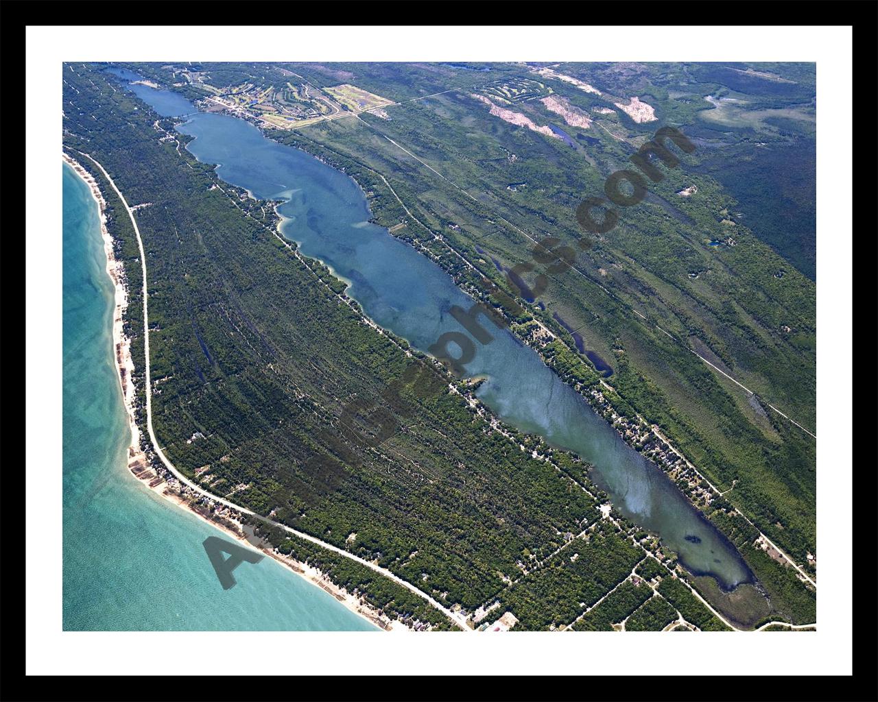 Aerial image of [5547] Cedar Lake (Looking South) in Iosco, MI with Black Metal frame