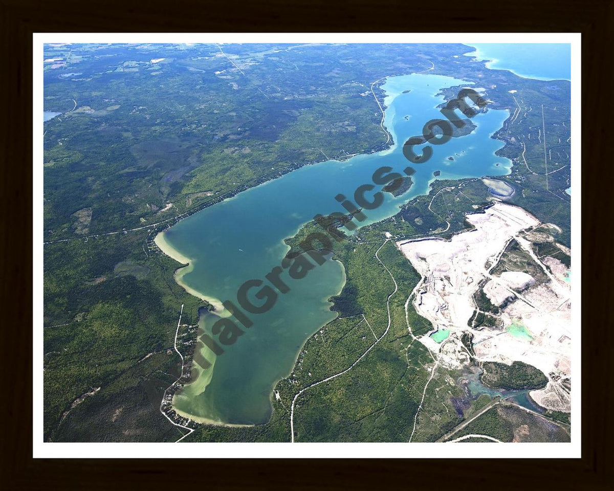 Aerial image of [5552] Grand Lake (Looking North) in Presque Isle, MI with Black Wood frame