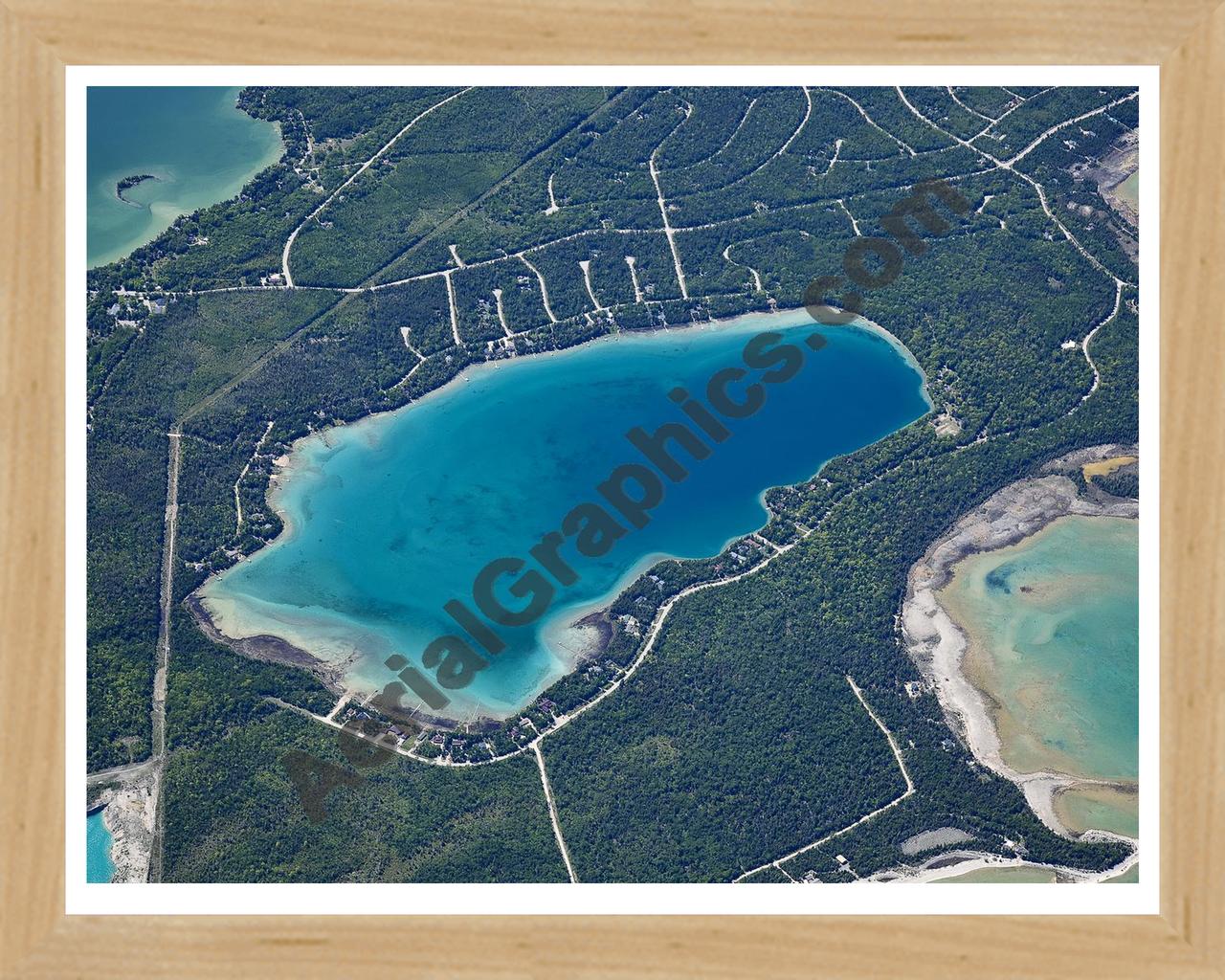 Aerial image of [5553] Lake Esau in Presque Isle, MI with Natural Wood frame