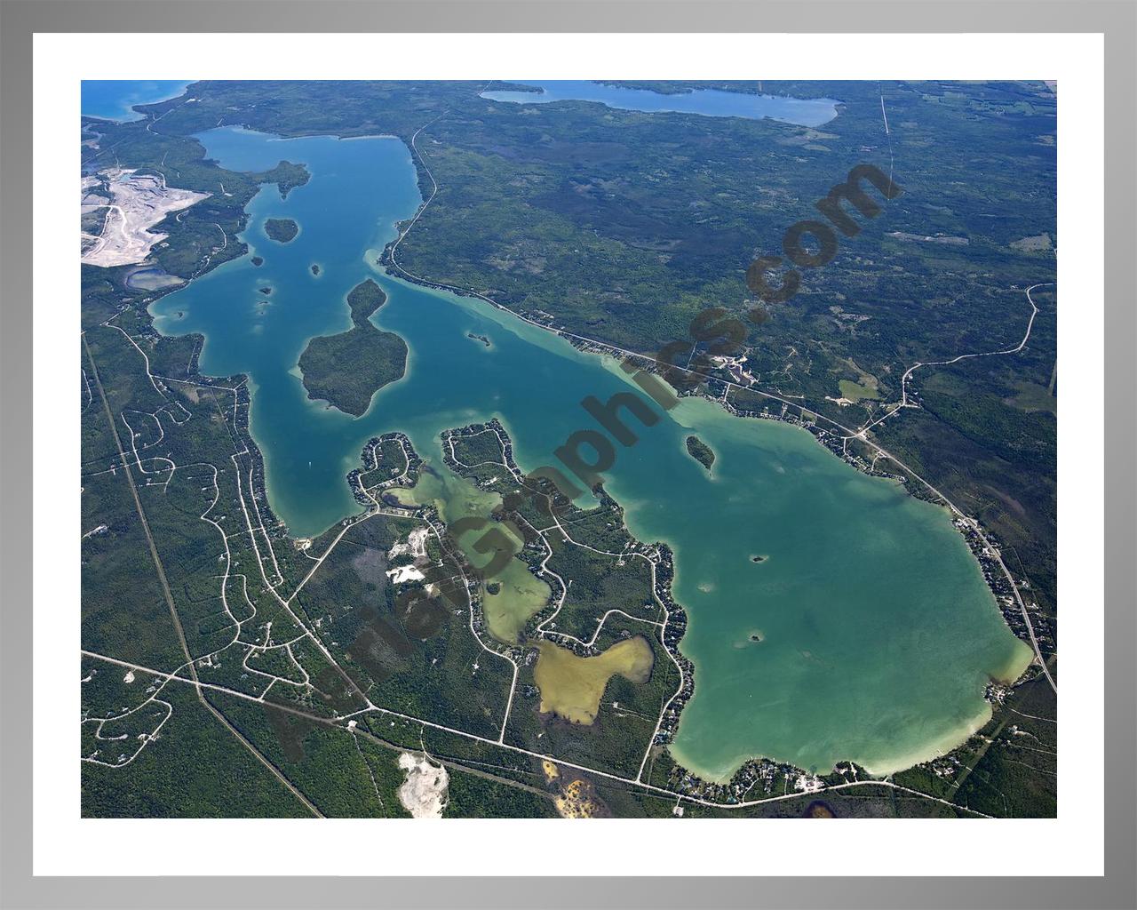 Aerial image of [5555] Grand Lake (Looking South) in Presque Isle, MI with Silver Metal frame