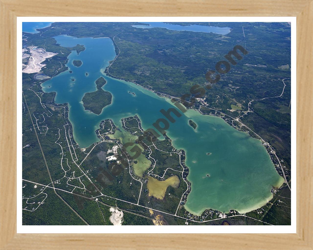 Aerial image of [5555] Grand Lake (Looking South) in Presque Isle, MI with Natural Wood frame