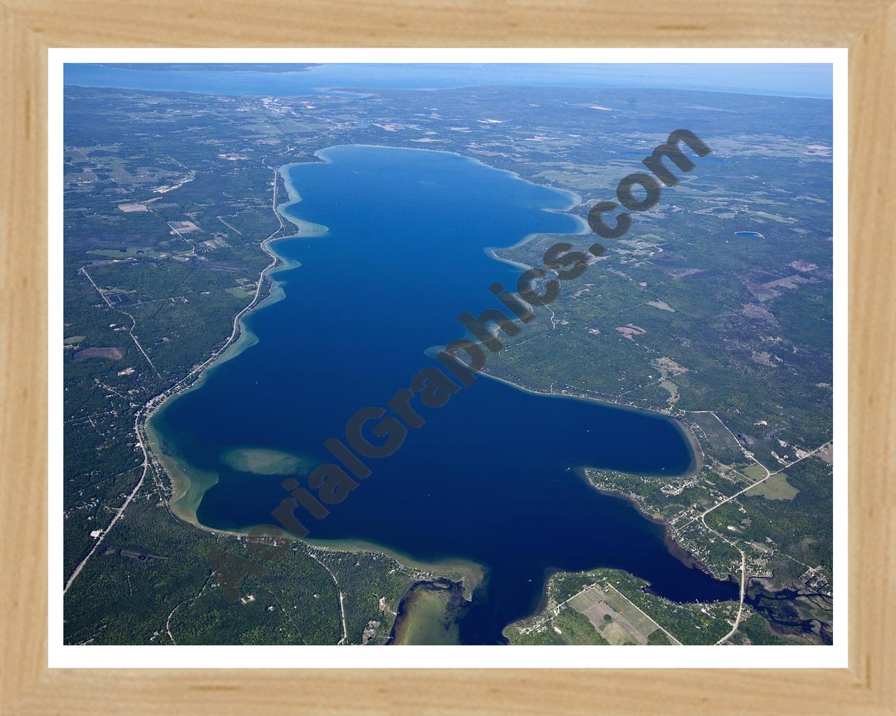 Aerial image of [5557] Mullett Lake in Cheboygan, MI with Natural Wood frame