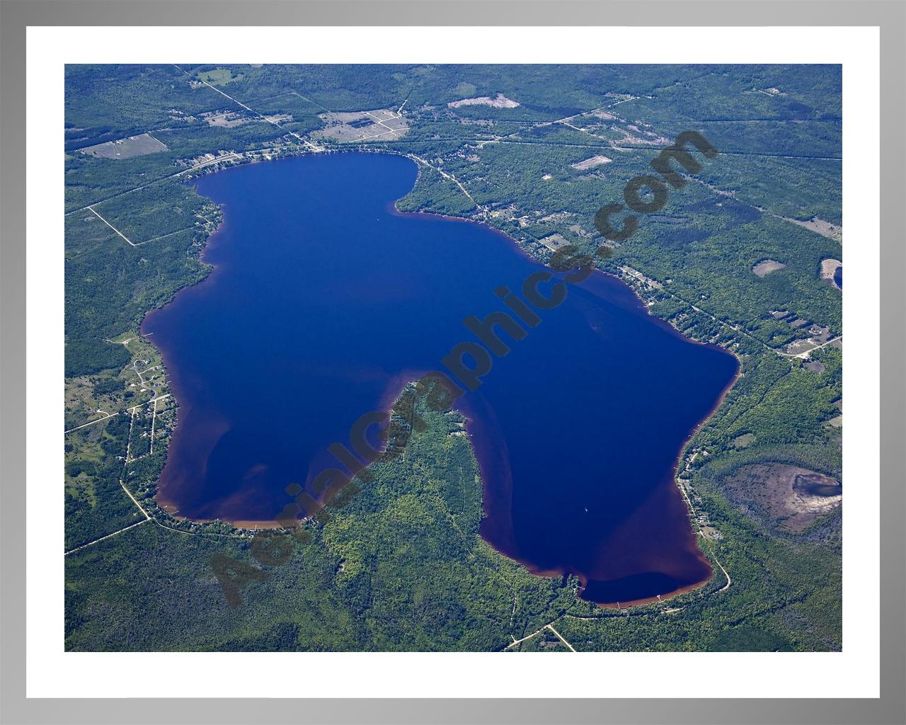 Aerial image of [5561] Lake Paradise in Emmet, MI with Silver Metal frame