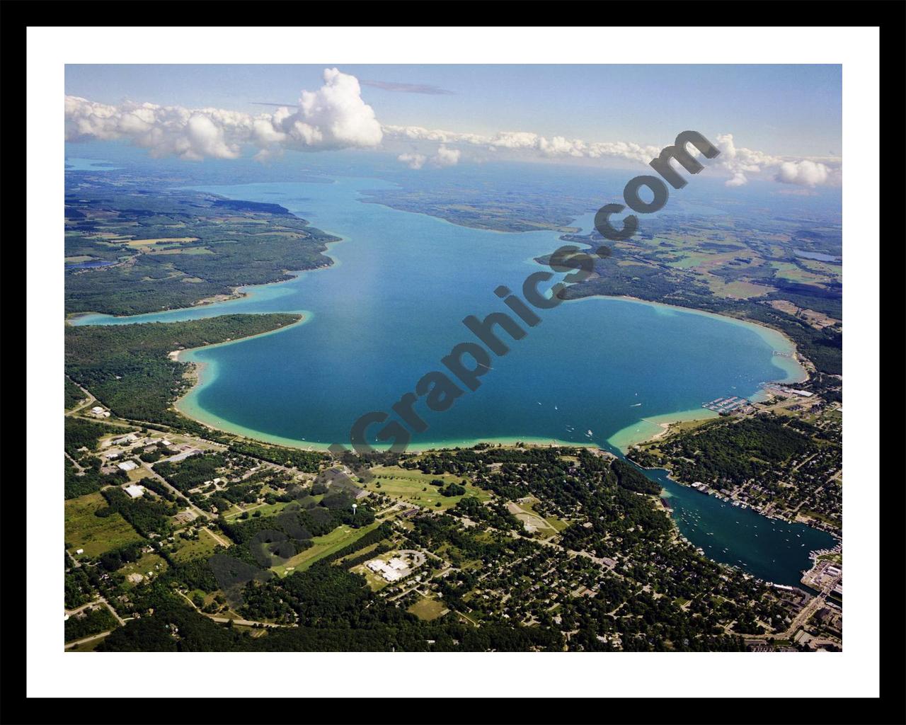 Aerial image of [5564] Lake Charlevoix (Looking South East) in Charlevoix, MI with Black Metal frame