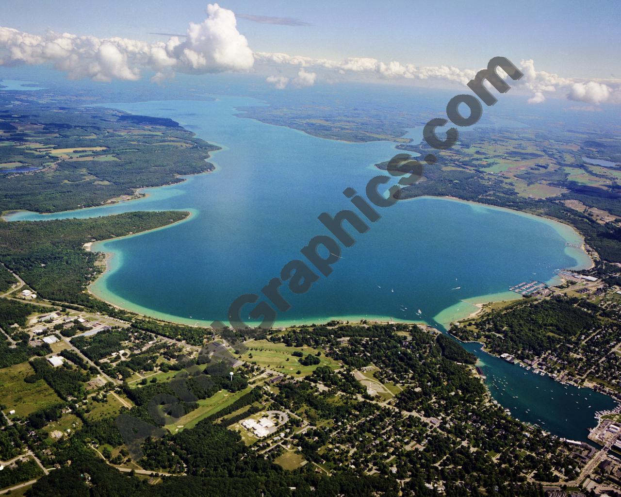 Aerial image of [5564] Lake Charlevoix (Looking South East) in Charlevoix, MI with No frame