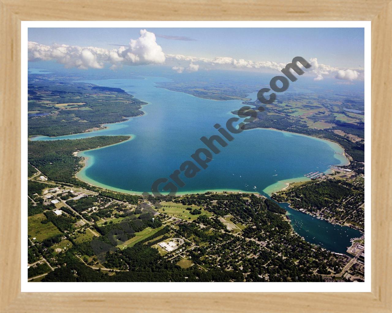 Aerial image of [5564] Lake Charlevoix (Looking South East) in Charlevoix, MI with Natural Wood frame