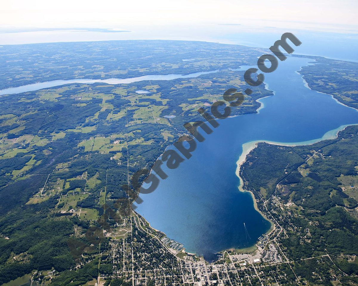 Aerial image of [5565] Lake Charlevoix (Looking West) in Charlevoix, MI with No frame