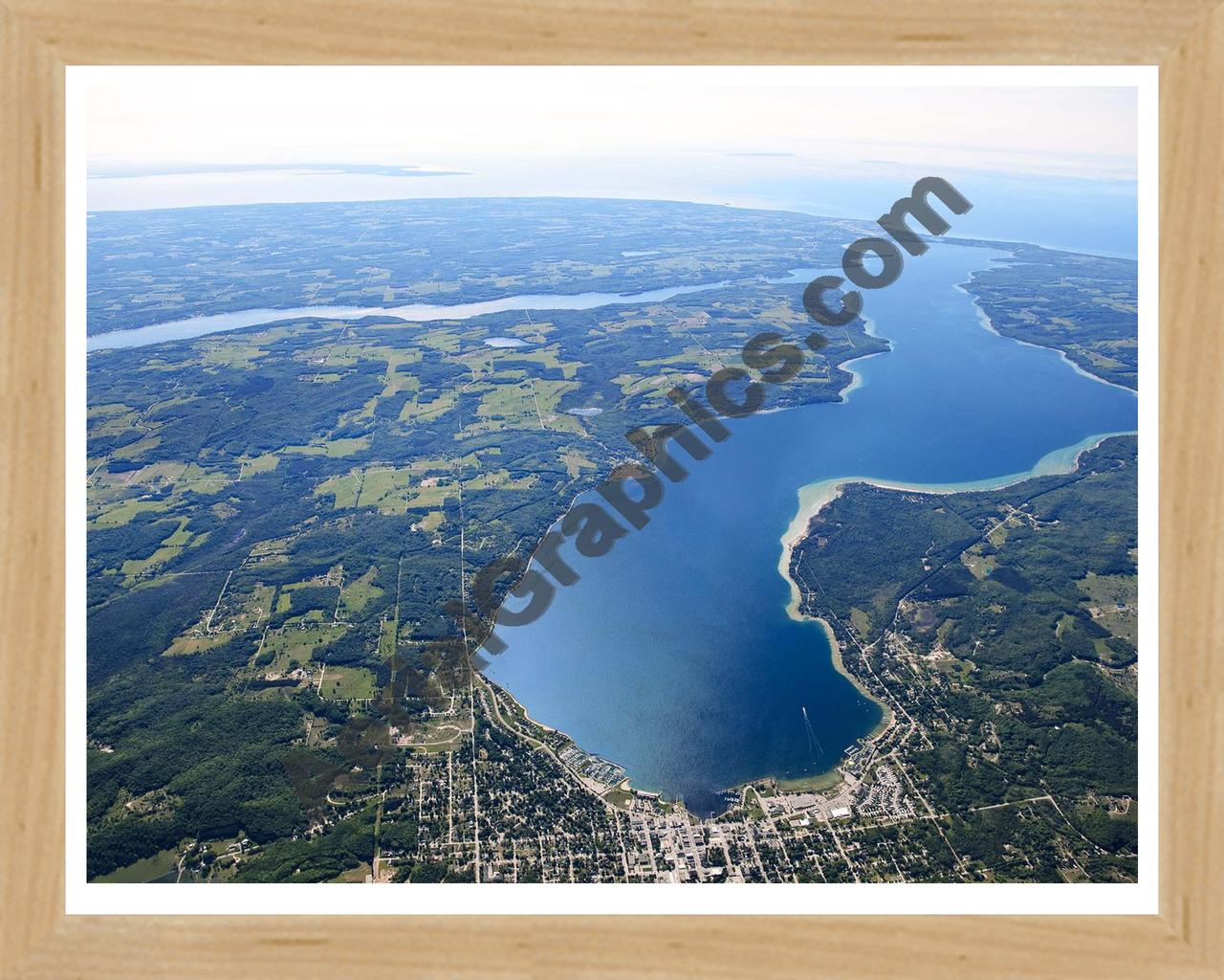 Aerial image of [5565] Lake Charlevoix (Looking West) in Charlevoix, MI with Natural Wood frame