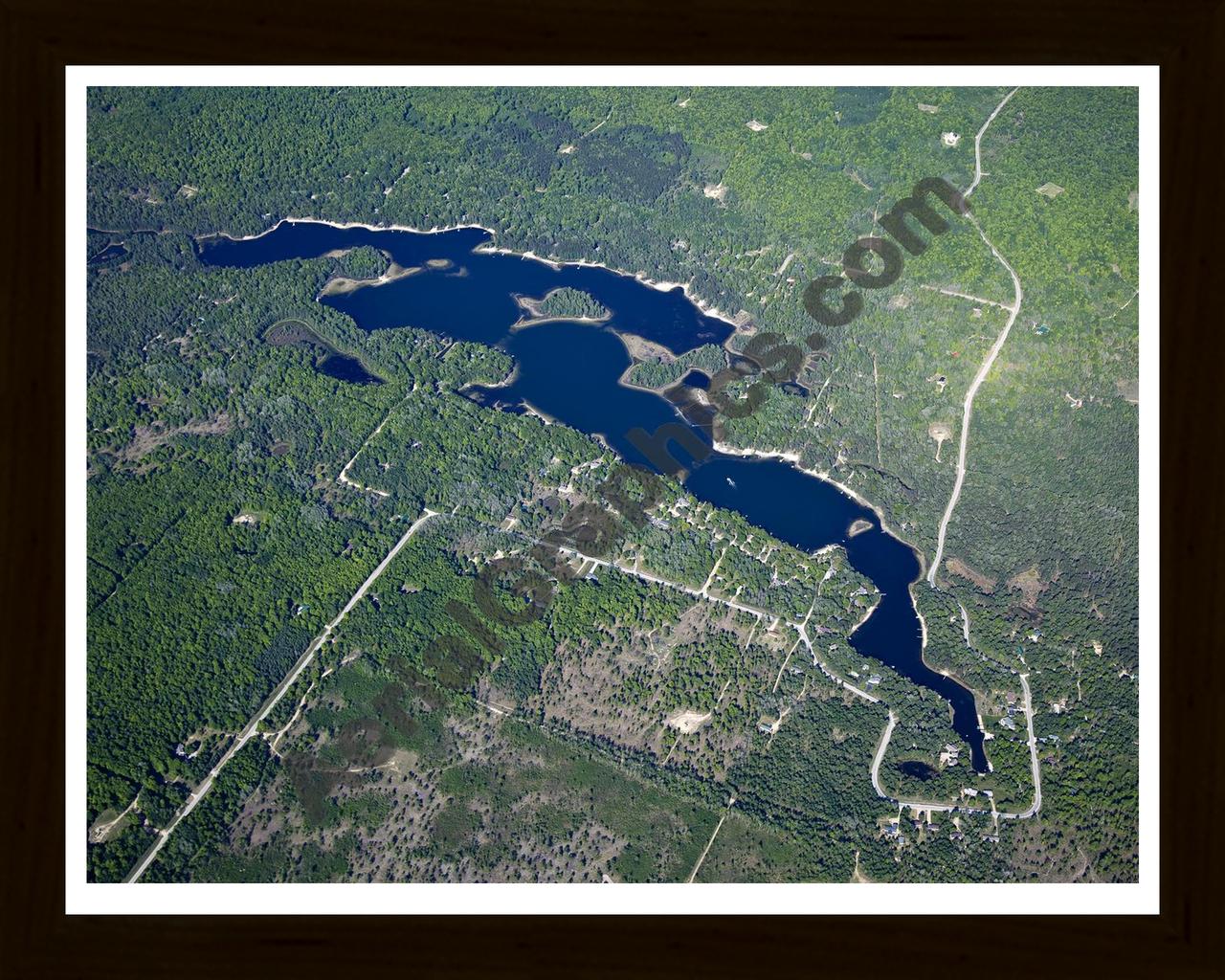 Aerial image of [5568] Lake Manuka in Otsego, MI with Black Wood frame