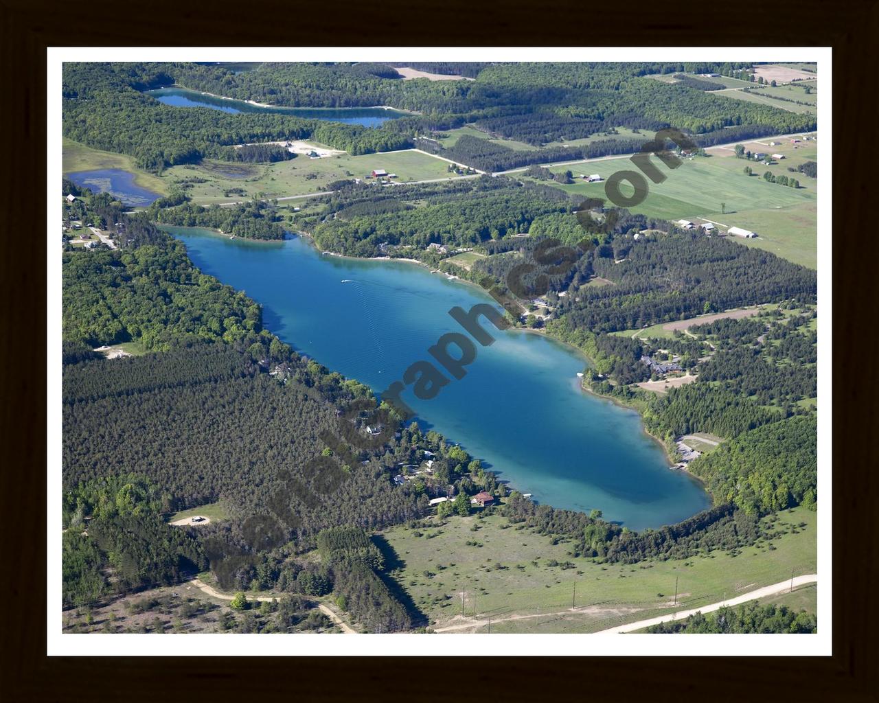 Aerial image of [5570] Dixon Lake in Otsego, MI with Black Wood frame