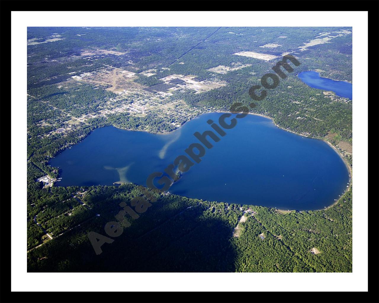 Aerial image of [5573] East Twin Lake in Montmorency, MI with Black Metal frame