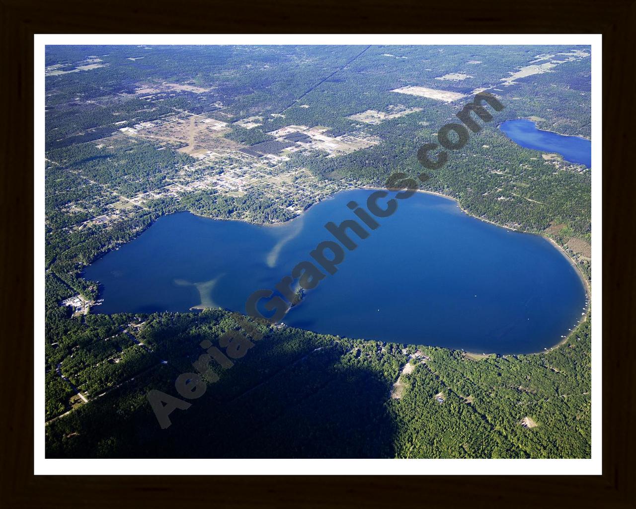 Aerial image of [5573] East Twin Lake in Montmorency, MI with Black Wood frame