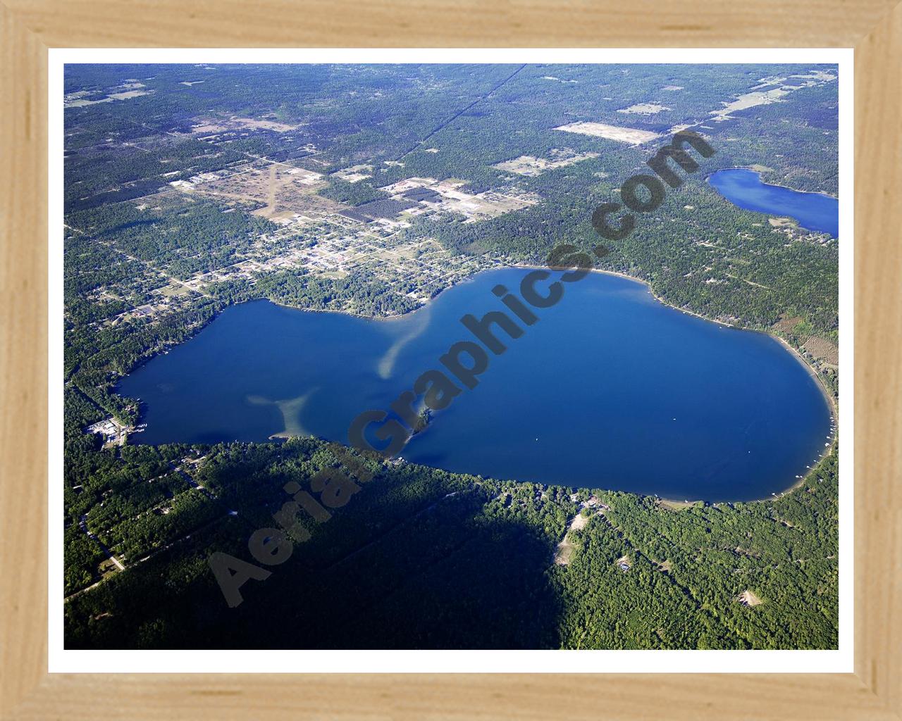 Aerial image of [5573] East Twin Lake in Montmorency, MI with Natural Wood frame