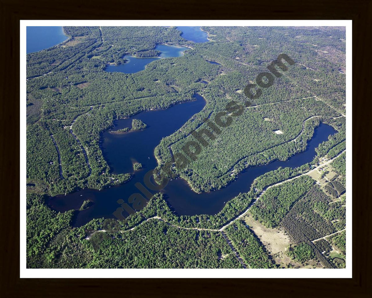 Aerial image of [5574] Tee Lake in Oscoda, MI with Black Wood frame