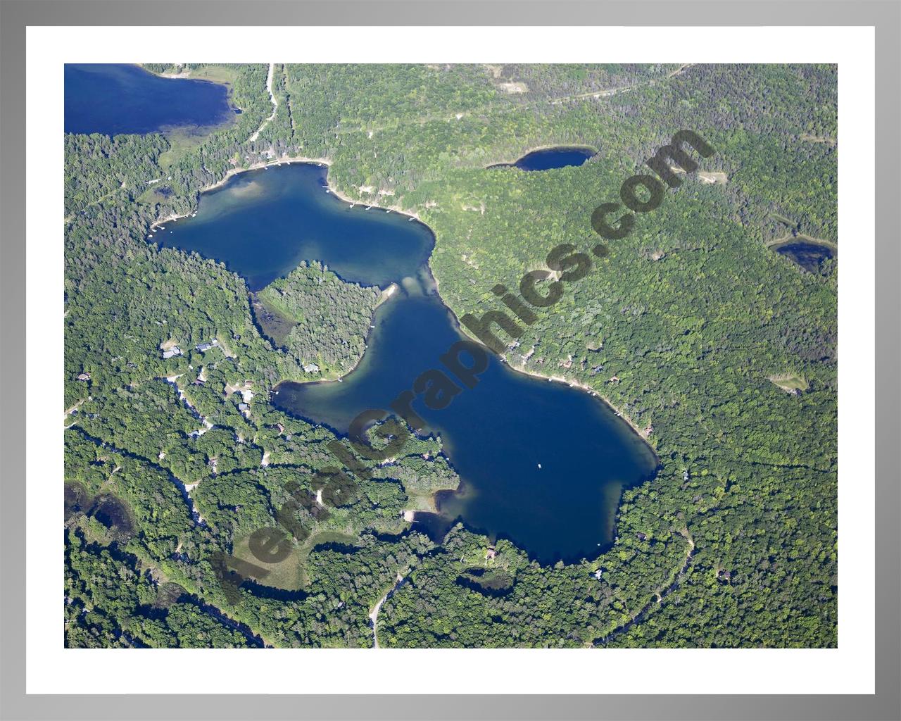 Aerial image of [5576] Little Wolf Lake in Montmorency, MI with Silver Metal frame