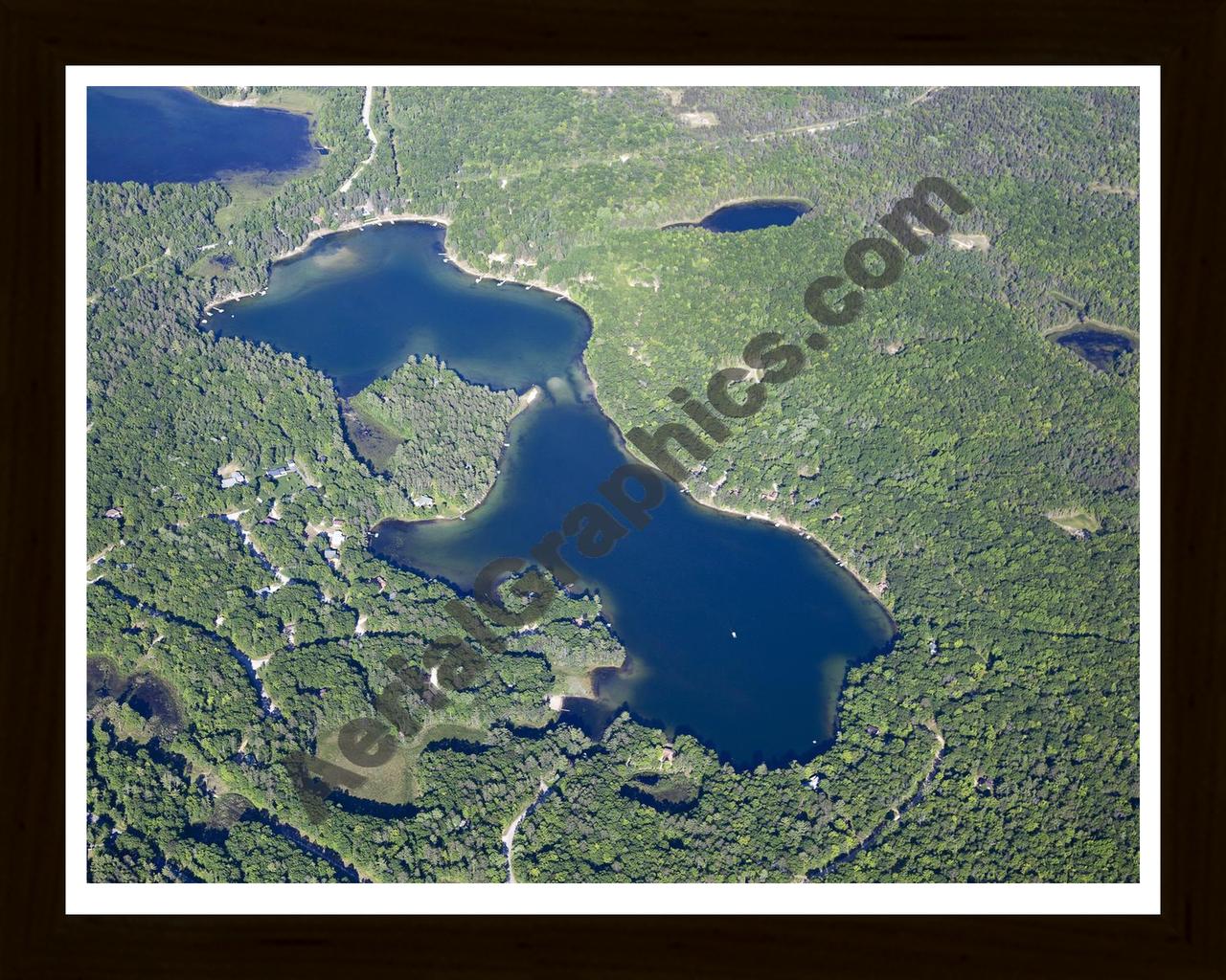 Aerial image of [5576] Little Wolf Lake in Montmorency, MI with Black Wood frame