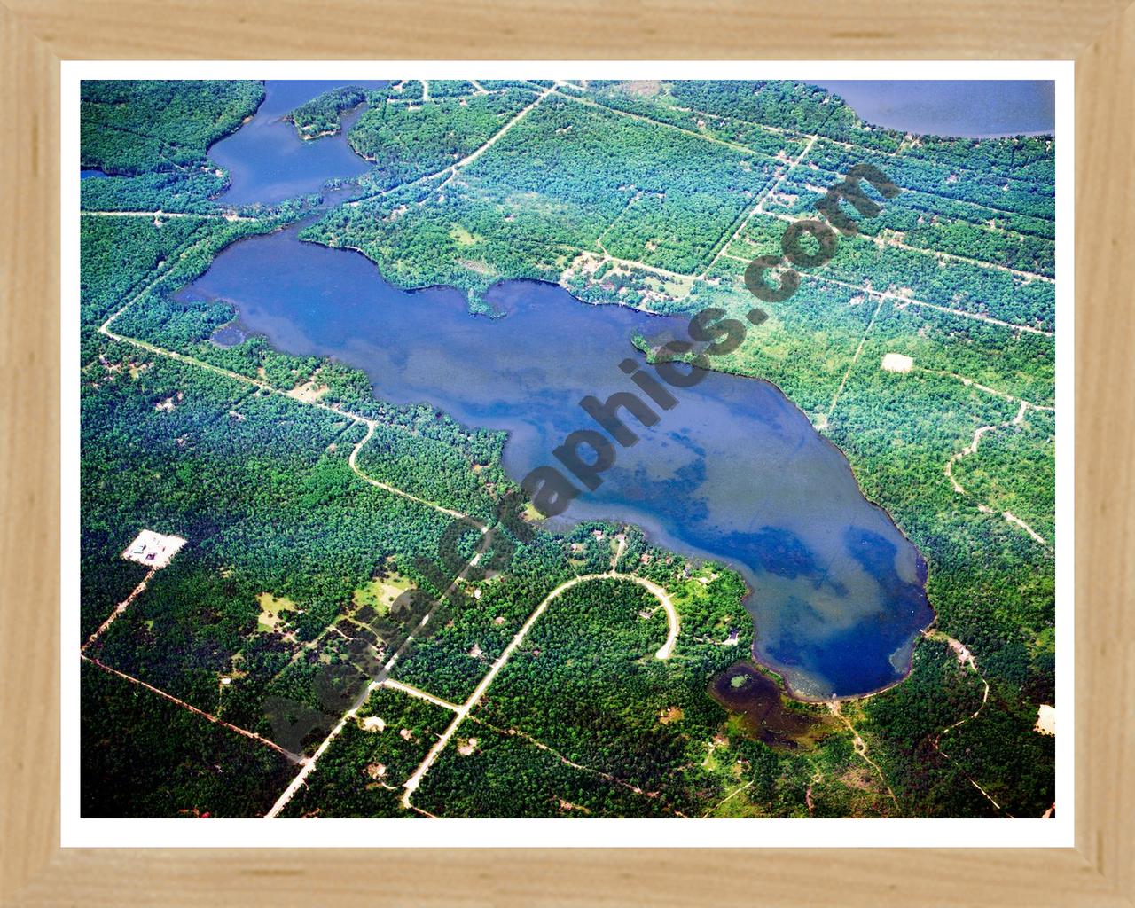 Aerial image of [5577] Lake Big Wolf in Montmorency, MI with Natural Wood frame