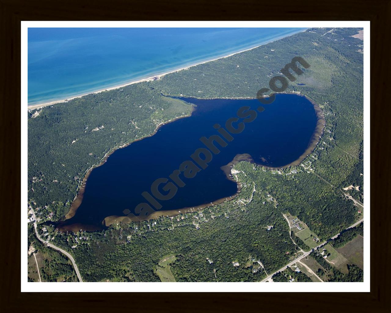 Aerial image of [5584] Bass Lake in MASON, MI with Black Wood frame