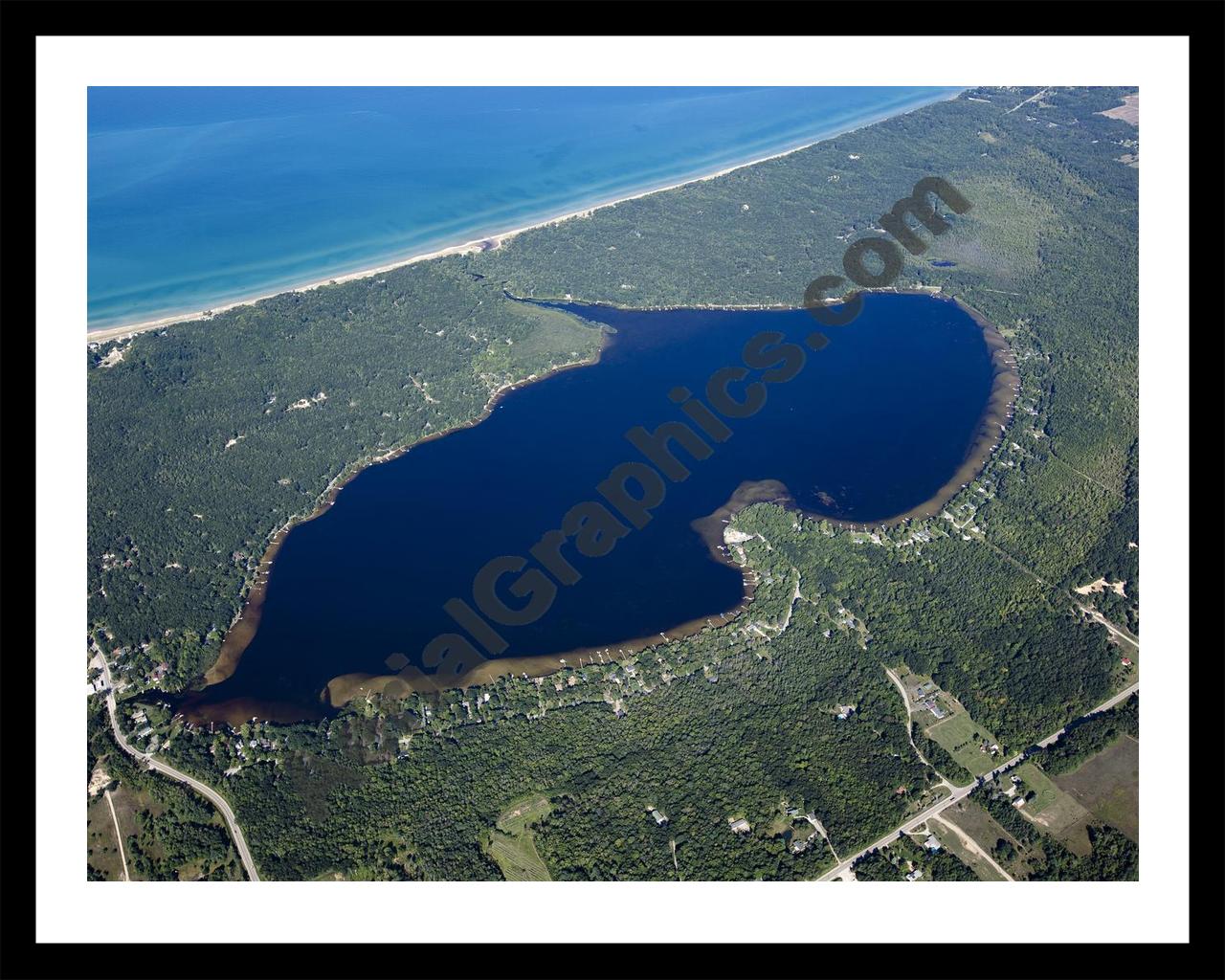 Aerial image of [5584] Bass Lake in MASON, MI with Black Metal frame