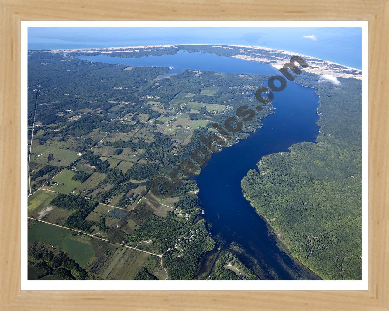 Aerial image of [5587] Hamlin Lake, Looking West in Mason, MI with Natural Wood frame