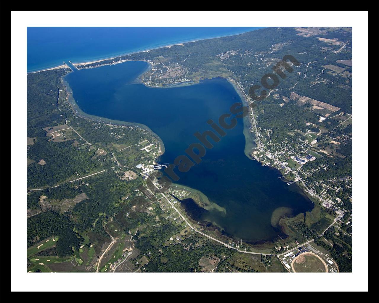 Aerial image of [5590] Portage Lake in Manistee, MI with Black Metal frame