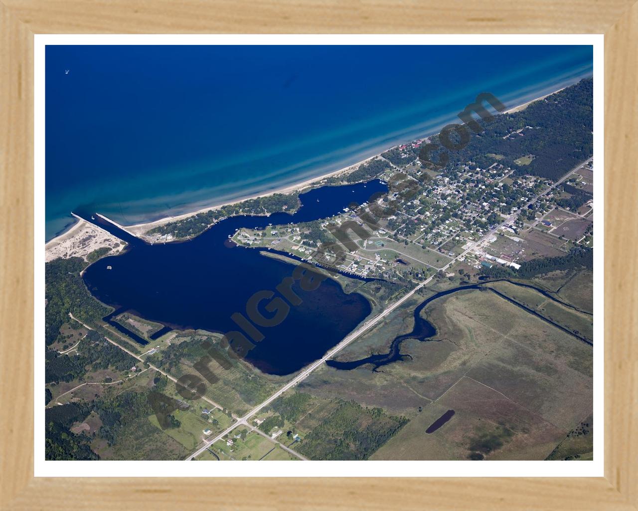 Aerial image of [5592] Arcadia Lake in Manistee, MI with Natural Wood frame