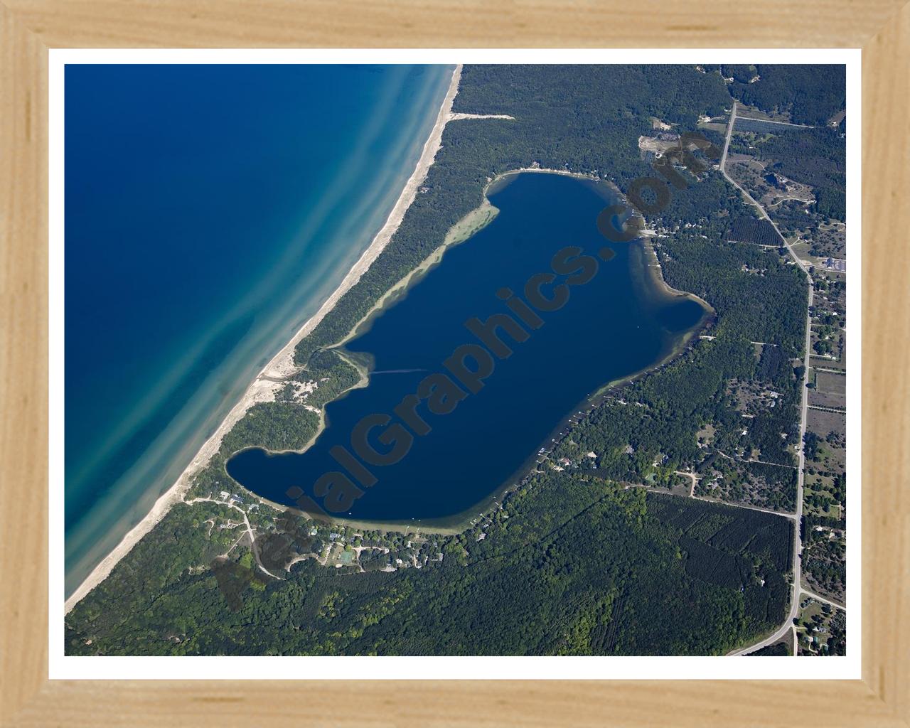 Aerial image of [5593] Lower Herring Lake in Benzie, MI with Natural Wood frame