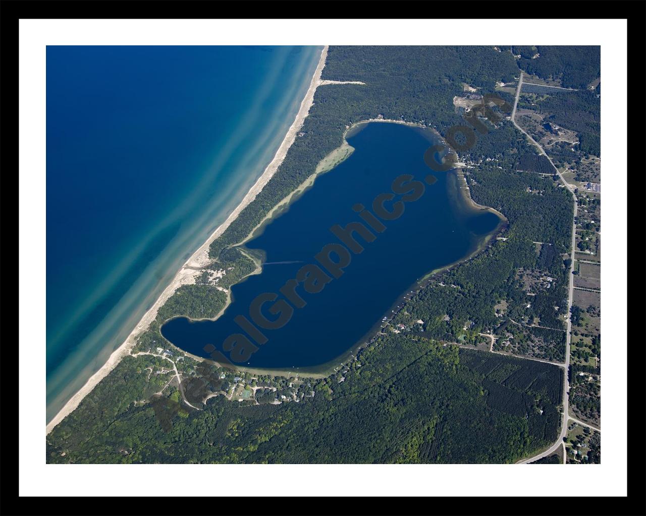 Aerial image of [5593] Lower Herring Lake in Benzie, MI with Black Metal frame