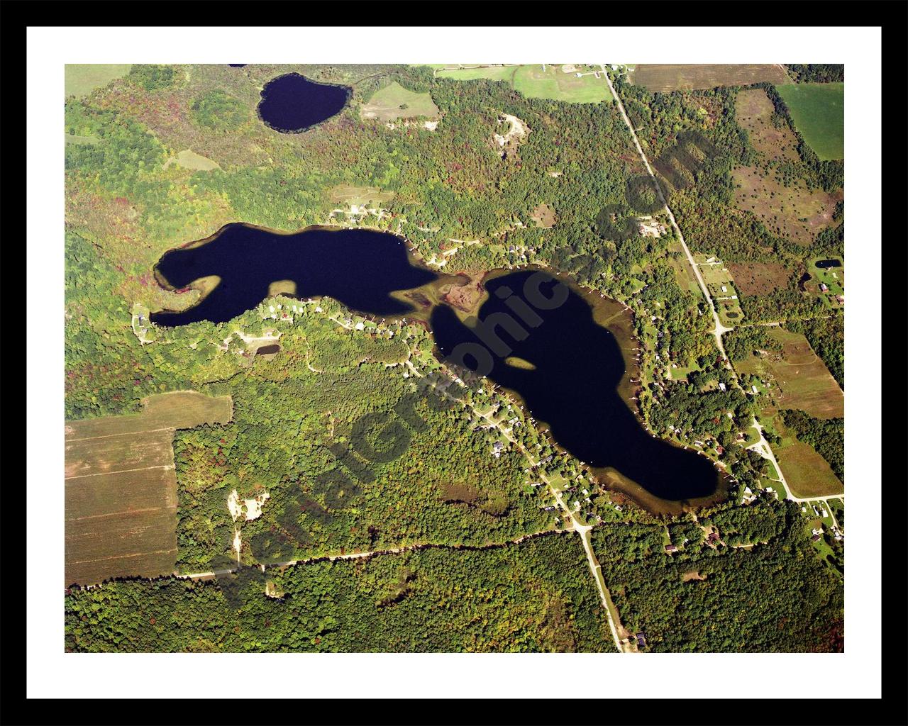 Aerial image of [559] Montcalm Lake in Montcalm, MI with Black Metal frame