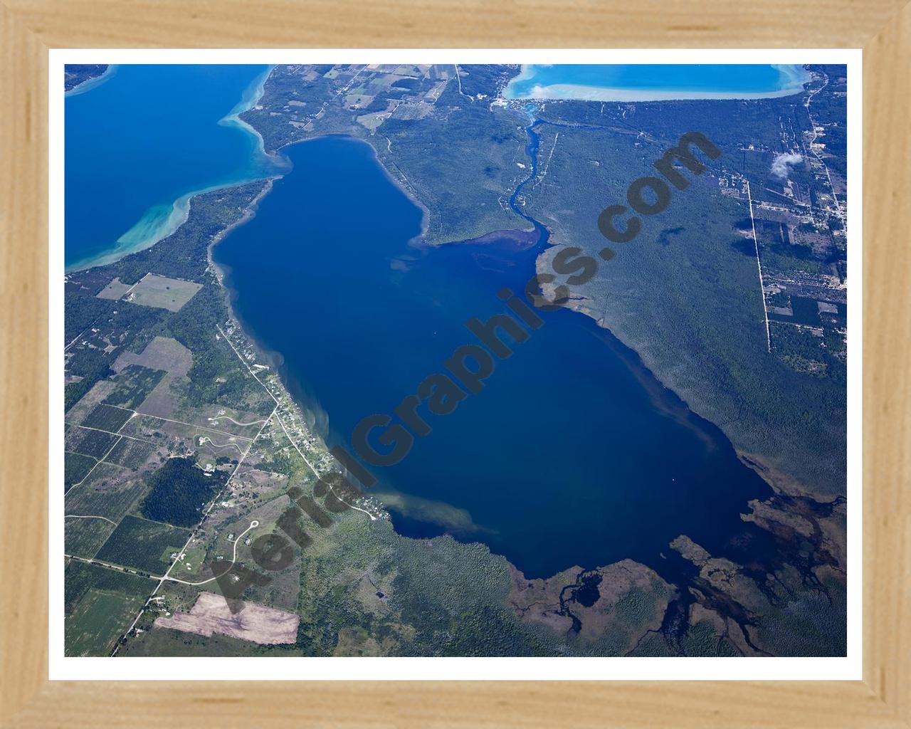 Aerial image of [5600] Lake Skegemog in Grand Traverse, MI with Natural Wood frame