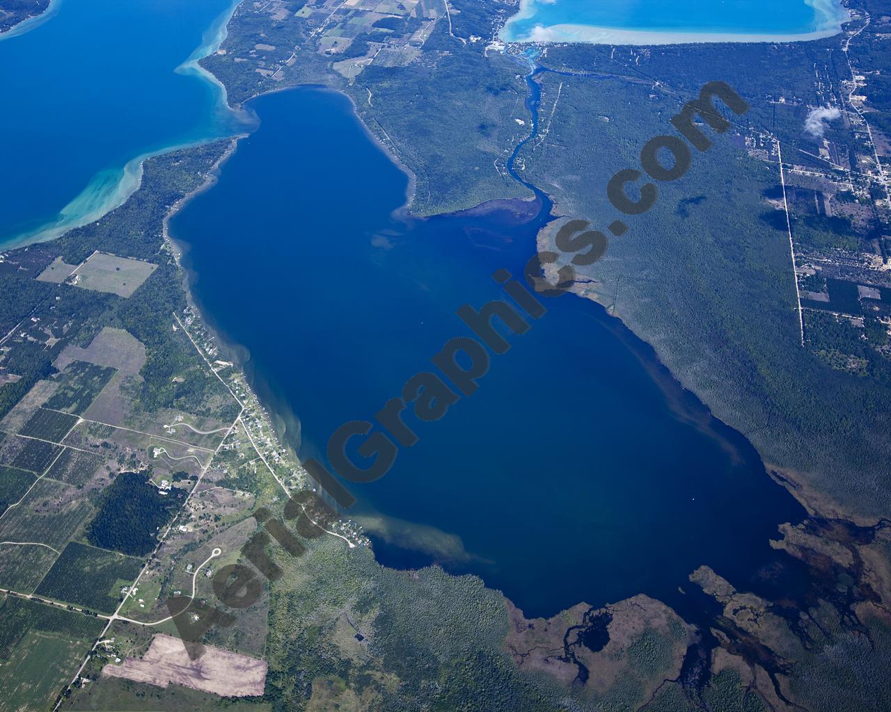 Aerial image of [5600] Lake Skegemog in Grand Traverse, MI with Canvas Wrap frame