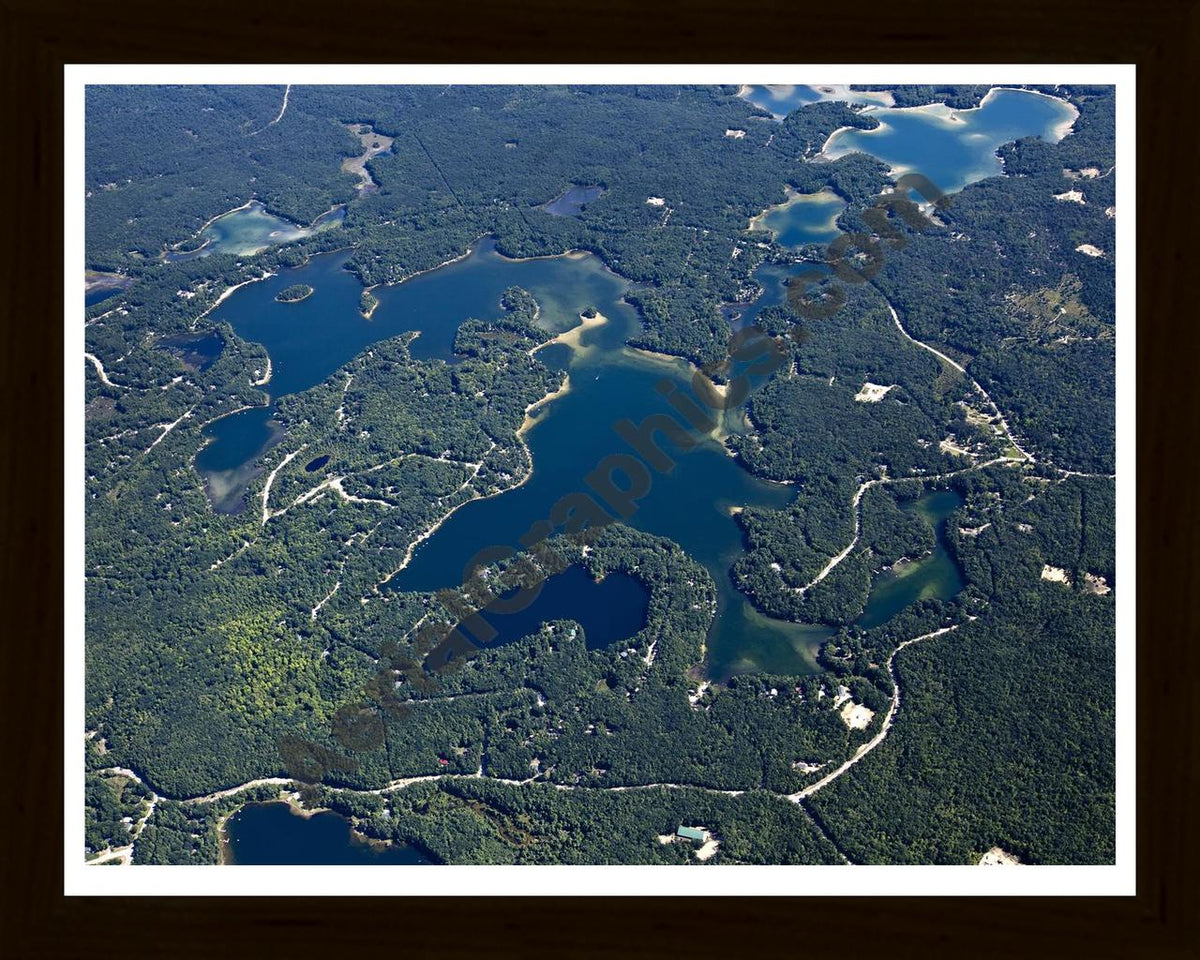 Aerial image of [5605] Spider Lake in Grand Traverse, MI with Black Wood frame