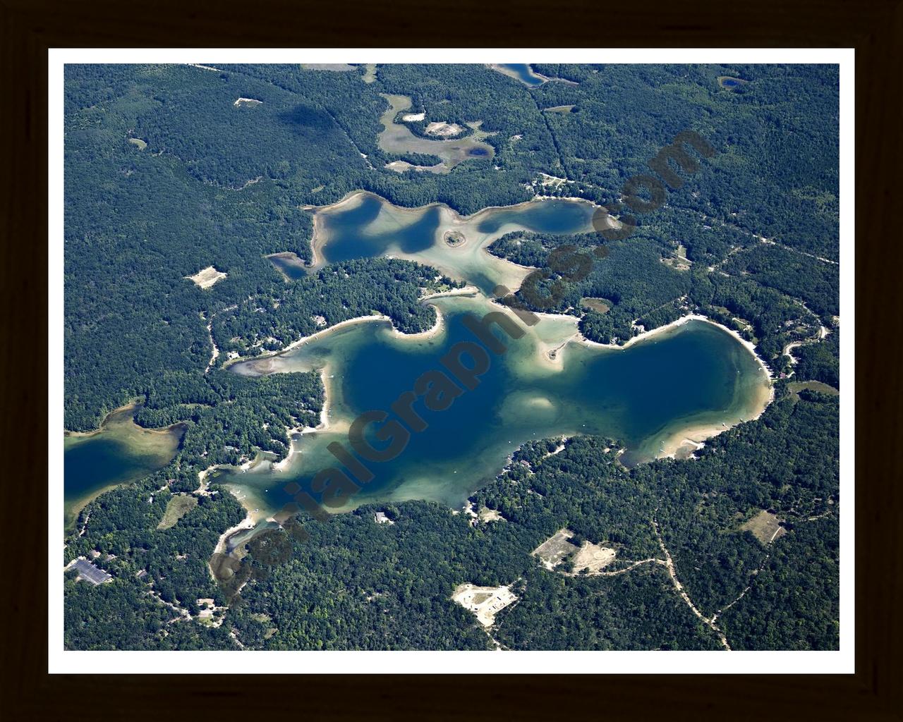 Aerial image of [5606] Rennie Lake in Grand Traverse, MI with Black Wood frame