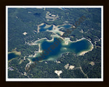 Aerial image of [5606] Rennie Lake in Grand Traverse, MI with Black Wood frame