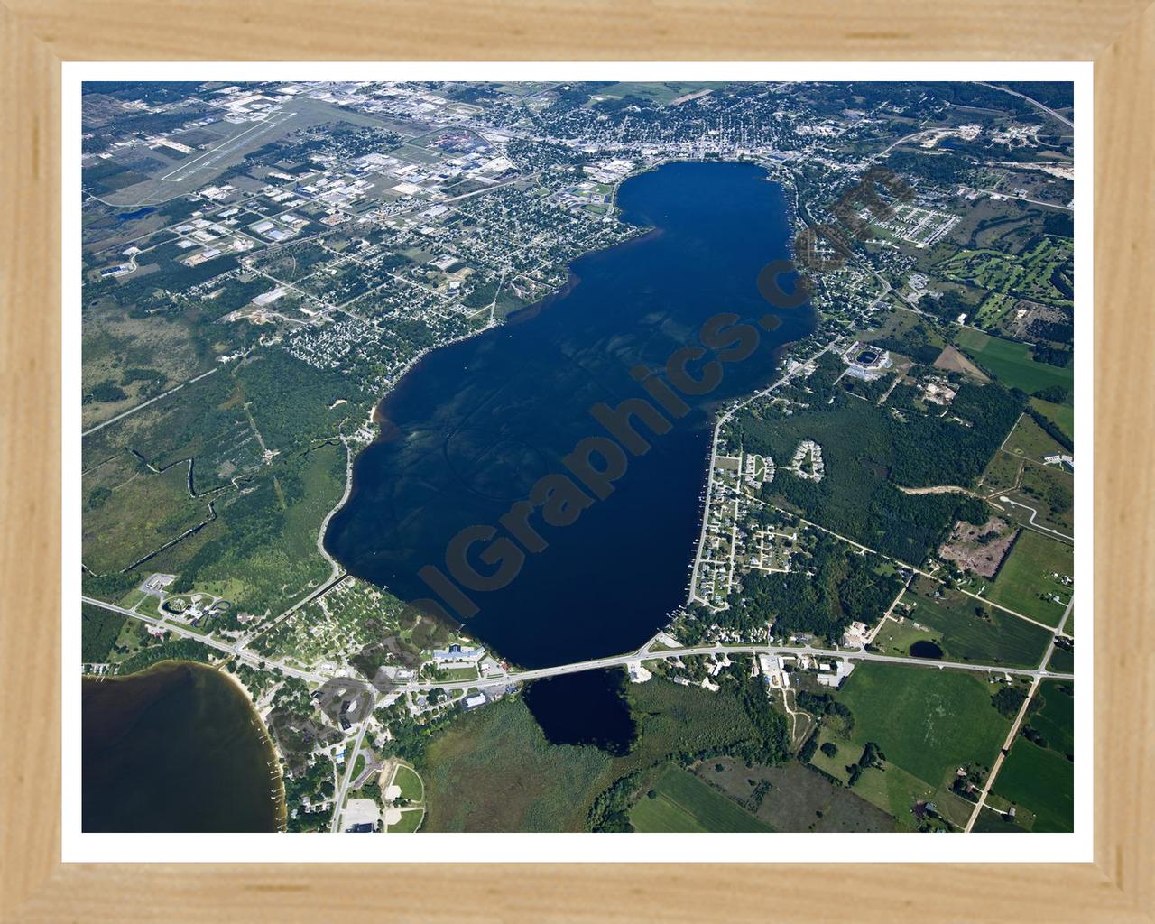 Aerial image of [5611] Lake Cadillac in Wexford, MI with Natural Wood frame