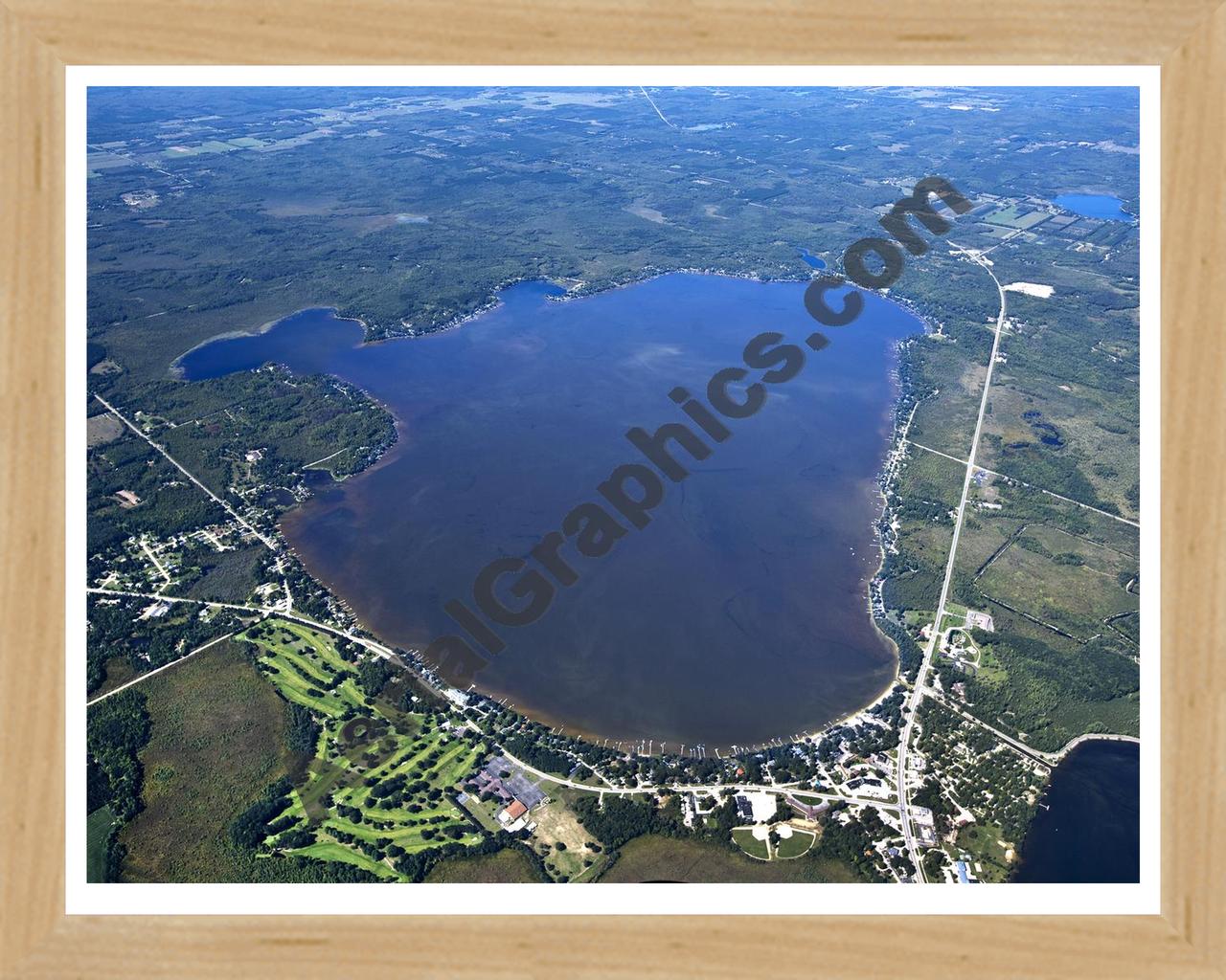 Aerial image of [5612] Lake Mitchell in Wexford, MI with Natural Wood frame