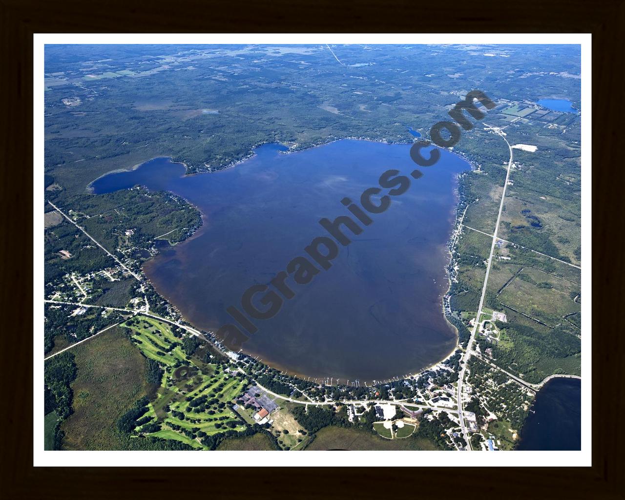 Aerial image of [5612] Lake Mitchell in Wexford, MI with Black Wood frame